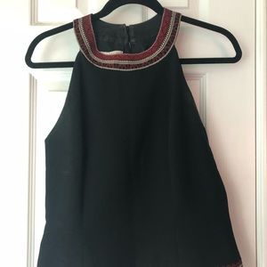 Black zip up tank top with red detail